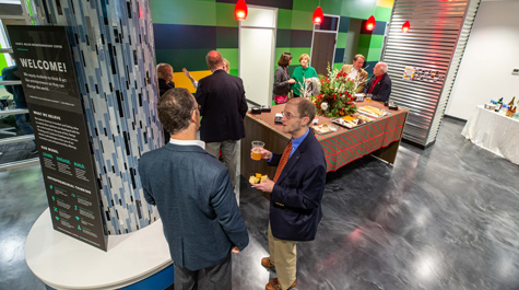 People enjoy beverages inside the entrepreneurship hub