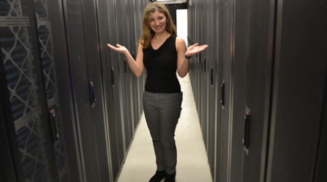Rachel Oberman stands inside the server room of William & Mary’s High Performance Computing cluster.