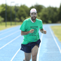 Michael Davis, legally blind, runs the track at Langley AFB