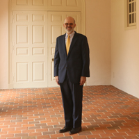 Michael R. Halleran in the portico of the Wren Building