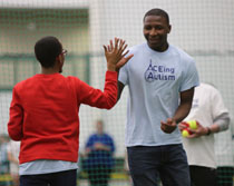 Two participants give each other a high-five. (Photo by Stephen Salpukas)