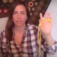 Sarah Balascio demonstrates art therapy in one of the website's videos.