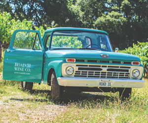 When Kent Fortner ’92 drives up, you know it’s him. He’s in the iconic 1966 light-green Ford F150 pickup truck from his wine labels. (Courtesy photo)
