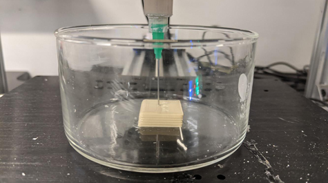 A 3D printer emits material