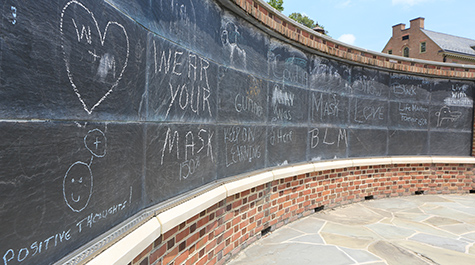 A chalkboard outside William & Mary's Integrated Science Center displays words of encouragement.