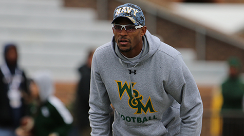 Michael London Jr. in W&M athletic wear and a Navy hat