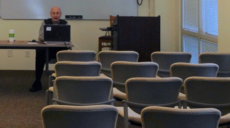 Osher Institute instructor Bill Riffer teaches his course  in an empty classroom 