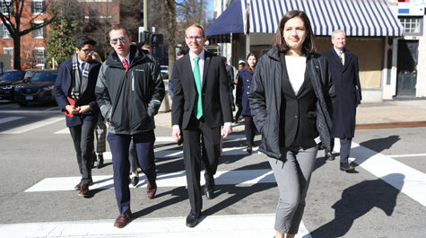 Students walk across a Richmond street