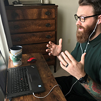 Zack Fetters teaches an online class on his laptop
