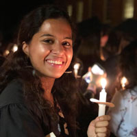 Shivani Gupta holding taper candle