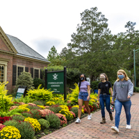 Students walking in front of admission office