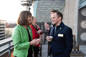 Ann Marie Stock, W&M's vice provost for academic and faculty affairs, talks with Doug Bunch ’02, J.D. ’06, a member of the Board of Visitors, during a Washington Center Advisory Board meeting in 2019.