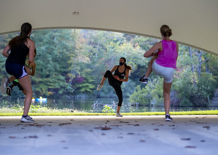 Outdoor FitWell classes were popular this past year in an effort to stay Healthy Together at W&M. In addition to maintaining access to classes that support physical health, W&M ramped up support for mental health amid the pandemic. (Photo by Jim Agnew)