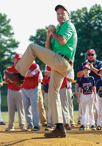 As mayor, Coleburn throws out the first pitch during a state all-star youth baseball tournament in Blackstone. (Courtesy photo)