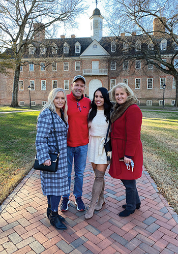 Billy Coleburn ’90 and Joyce Anzolut Coleburn ’90 visited William &amp; Mary in 2020 with their daughters, Mary Katherine (left) and Caroline. (Courtesy photo)