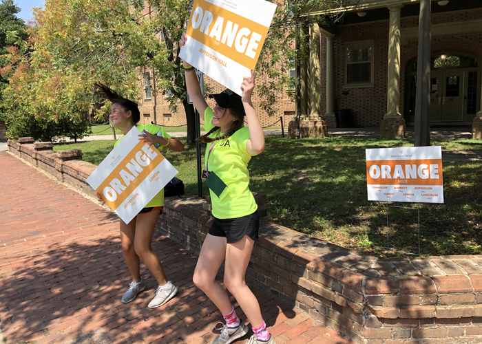 Marie Fulda '23 (right) and Sophie Pittaluga '23 welcome new students to campus in their roles as orientation aides. (Photo by Adrienne Berard)
