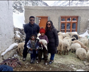 Dolma with a family in her home village taken during a month she volunteered tutoring local children. Dolma is the third of four daughters in a family of yak herders. (Courtesy photo)