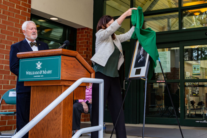 W&M President Katherine A. Rowe unveils a portrait of McLeod at the dedication. (Photo by Skip Rowland ’83)