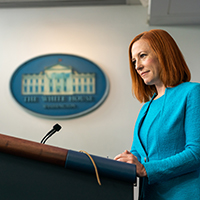 White House Press Secretary Jen Psaki addresses reporters from podium