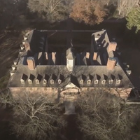 A aerial view of the Wren Building in the winter