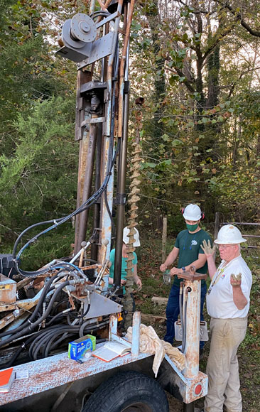Rick Berquist (right) at a drilling site with Dorian Miller '22 (center) and Marcie Occhi, a Virginia state geologist.
