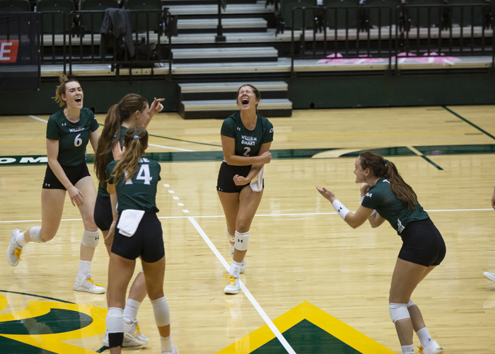 William & Mary athletics were a source of many of Holt's favorite photos. Holt said one of her favorite moments to capture was this celebration after a point by the volleyball team. (Photo by Jamie Holt)