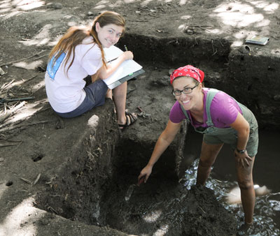 Undergrad Kelsey Frenkiel and grad student Summer Moore excavate on Maupiti