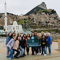 Students posing in front of the Rock of Gibraltar