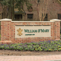 A brick sign that says William & Mary