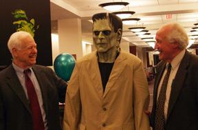 Fuchs (l) and Tiefel (r) pose with Frankenstein’s monster at Swem Library. By David Williard.