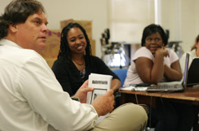 Nichol (l) talks about Petersburg with participants in the Phoenix Project. 