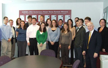 The D.C. contingent pose for a photograph at CSPAN headquarters with CSPAN president Brian Lamb and Professor Christine Nemacheck.