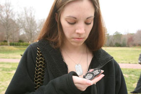 Honeycutt holds the dog tags of Jeff Webb. By Stephen Salpukas.