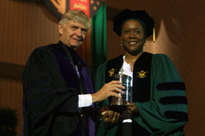 Allen receives the Thatcher Prize from Interim President Reveley. By Stephen Salpukas.