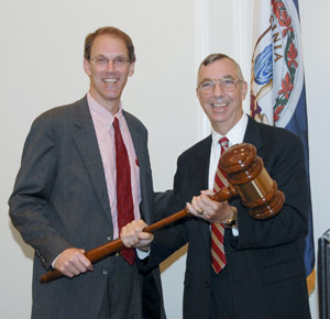 Outgoing Alliance Chair John Bacon (L) passes the gavel to Jim Golden (R) at the Alliance's Annual Membership Meeting on Sept. 23. (Photo by Colonial Photography ''Helen's Place'')