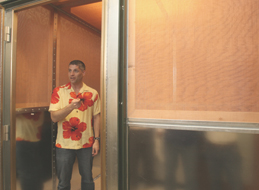 Paul Kieffaber, assistant professor of psychology, shows off one of the Faraday chambers in the department’s EEG lab. “We have two different booths where we can run,“ Kieffaber said. “We just pop them in a chair, put a cap on their heads and start recording their brain waves.” The Faraday chambers provide isolation from “noise” coming from lights and electrical sources. 