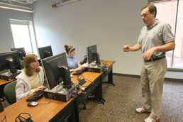 Peter Vishton works with a group of students in one of the new computer facilities in the ISC 2. One of the 16 psychology laboratories in the Integrated Science Center complex is a dedicated computer lab. Department Chair Constance Pilkington says, “I know everybody uses computers, but for psychologists, they really are our test tubes. We really wouldn’t be able to collect the data that we’re collecting without them.”