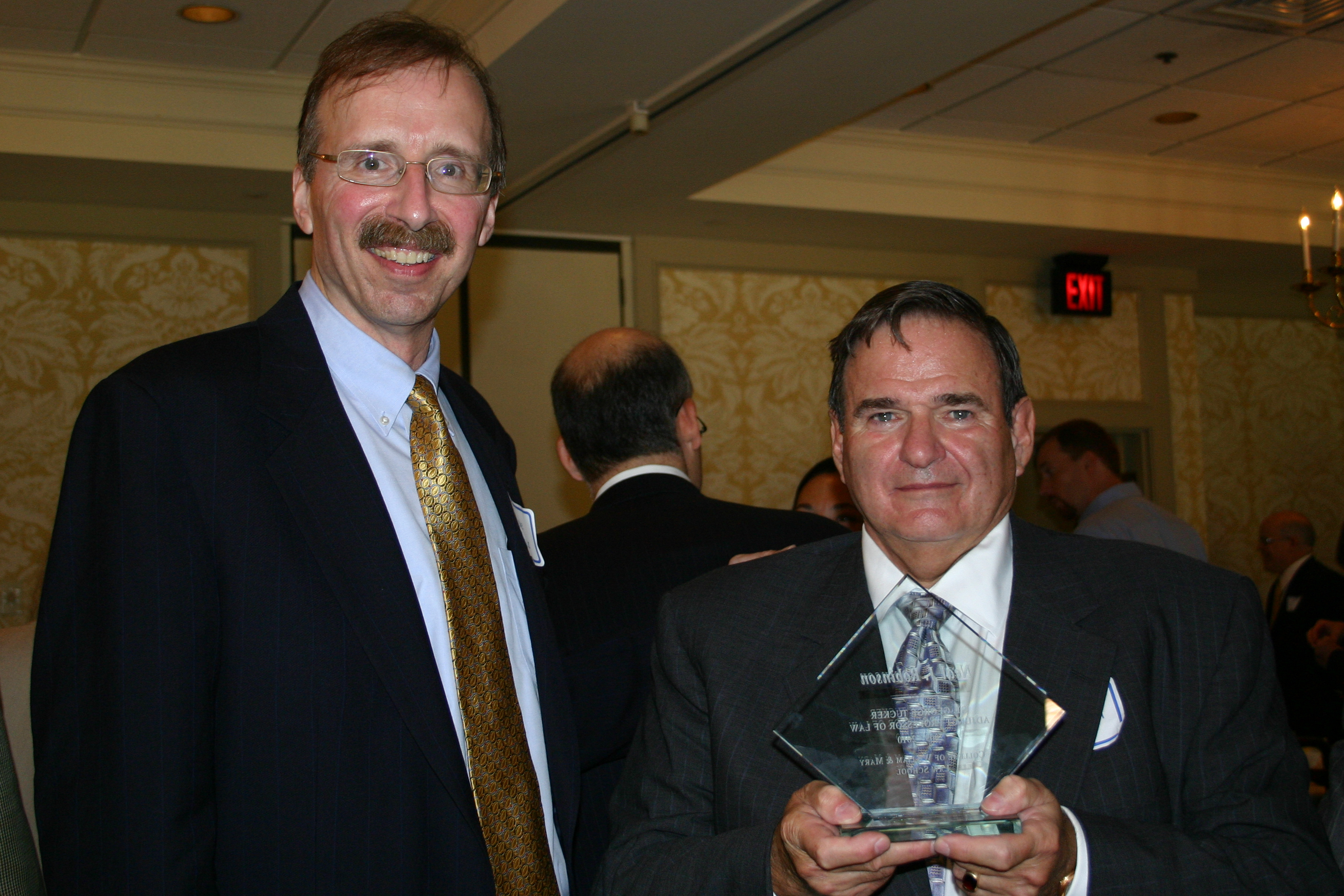 Law School Dean Davision Douglas (l) presents Robinson with the 2009 St. George Tucker Award