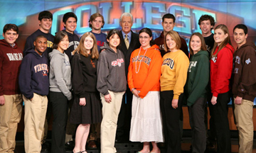 Tucker (back, right) with Alec Trebek (back, center) and the other 2009 College Championship contestants.