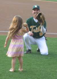 Wittman plays catch with his granddaughter