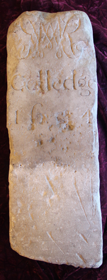 The cypher on a W&M boundary stone, housed today in the Special Collections Research Center at Swem Library