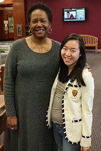 Jody Allen and Nicole Chung ’13 attend the exhibit opening. Chung wrote a biography of Jessie Rattley, former Newport News mayor. Photo by Kevin Kosanovich, Swem Library