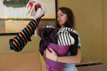 Victoria Bostler '17 gathers items from a collection point in DuPont. Photo by Stephen Salpukas.