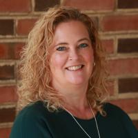 A profile picture presents Rena Delfico.