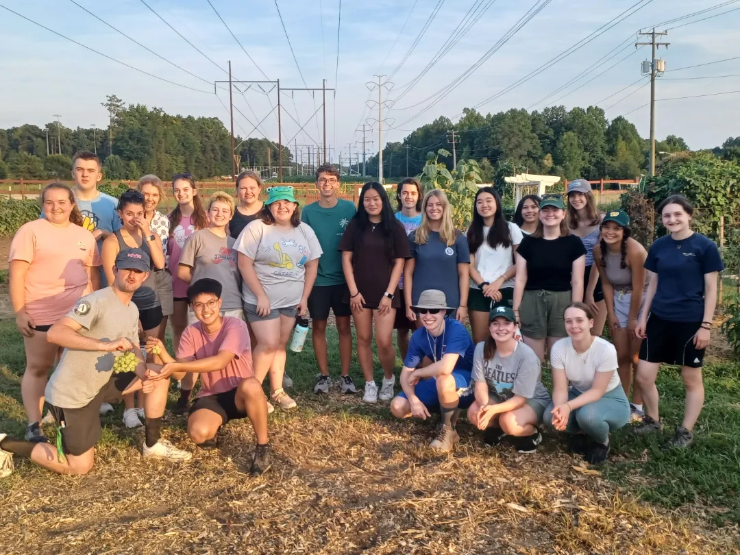 7 Generations 2023 team at a community garden