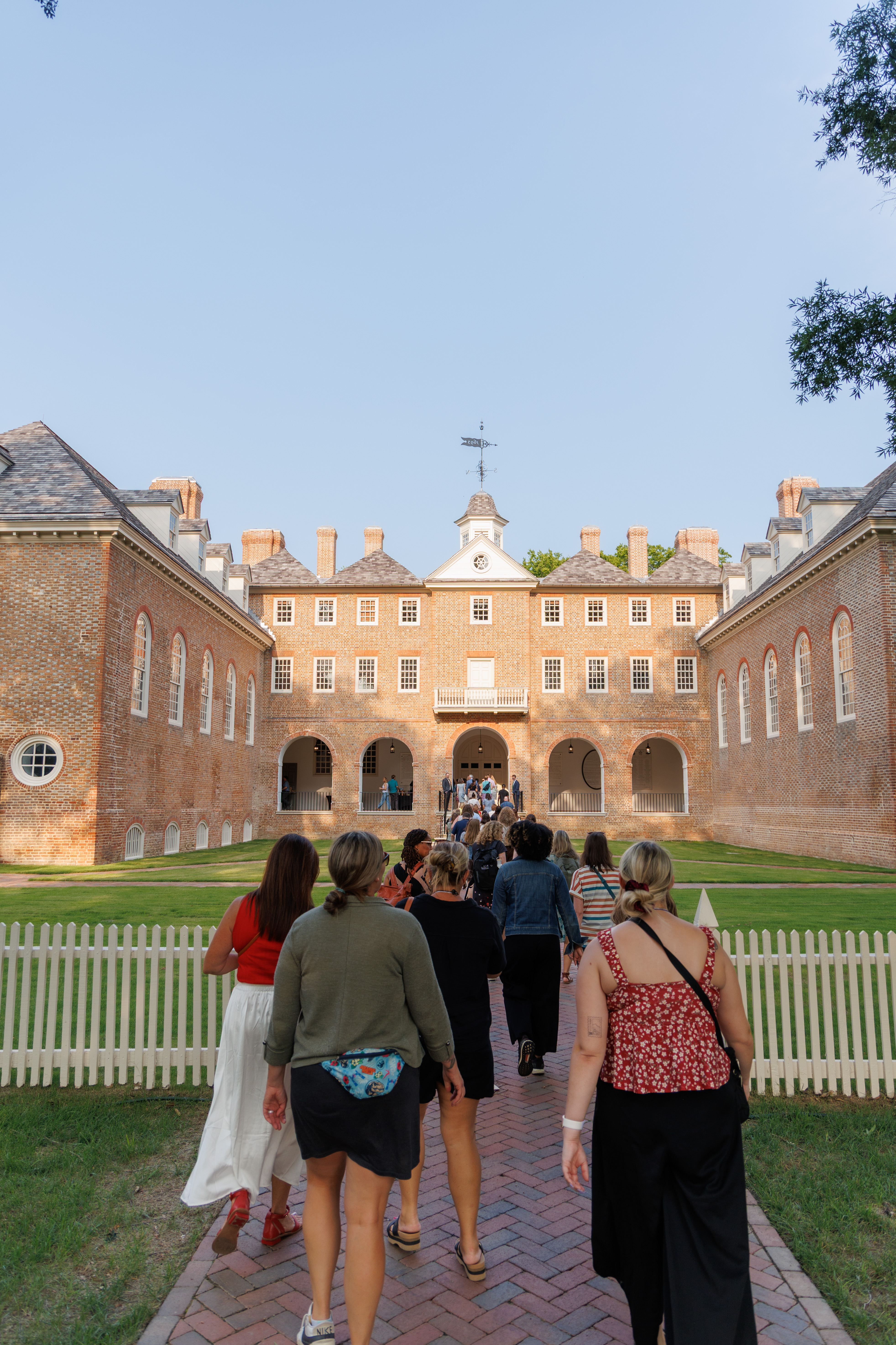 Delegates from We the Teachers walk to the historic Wren Building at W&M