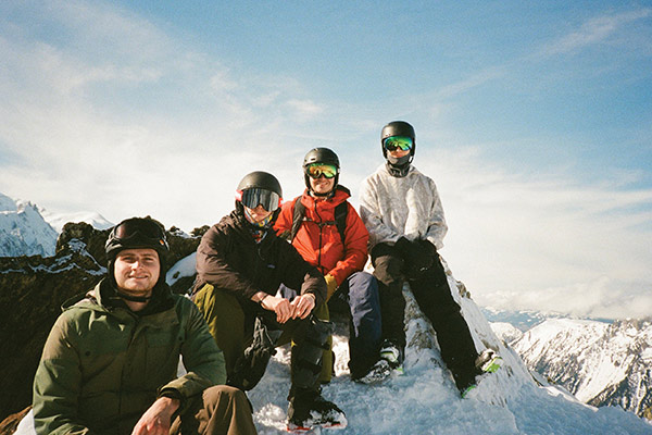 Sigma Pi members pose for a photo on a snowboarding trip.