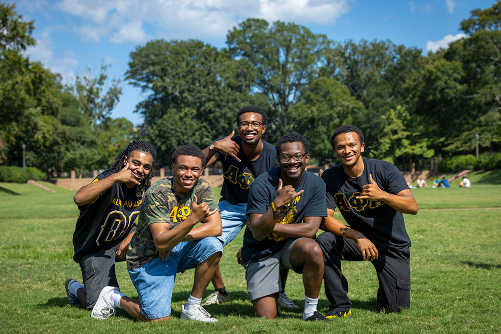 Alpha Phi Alpha members pose for a group photo.