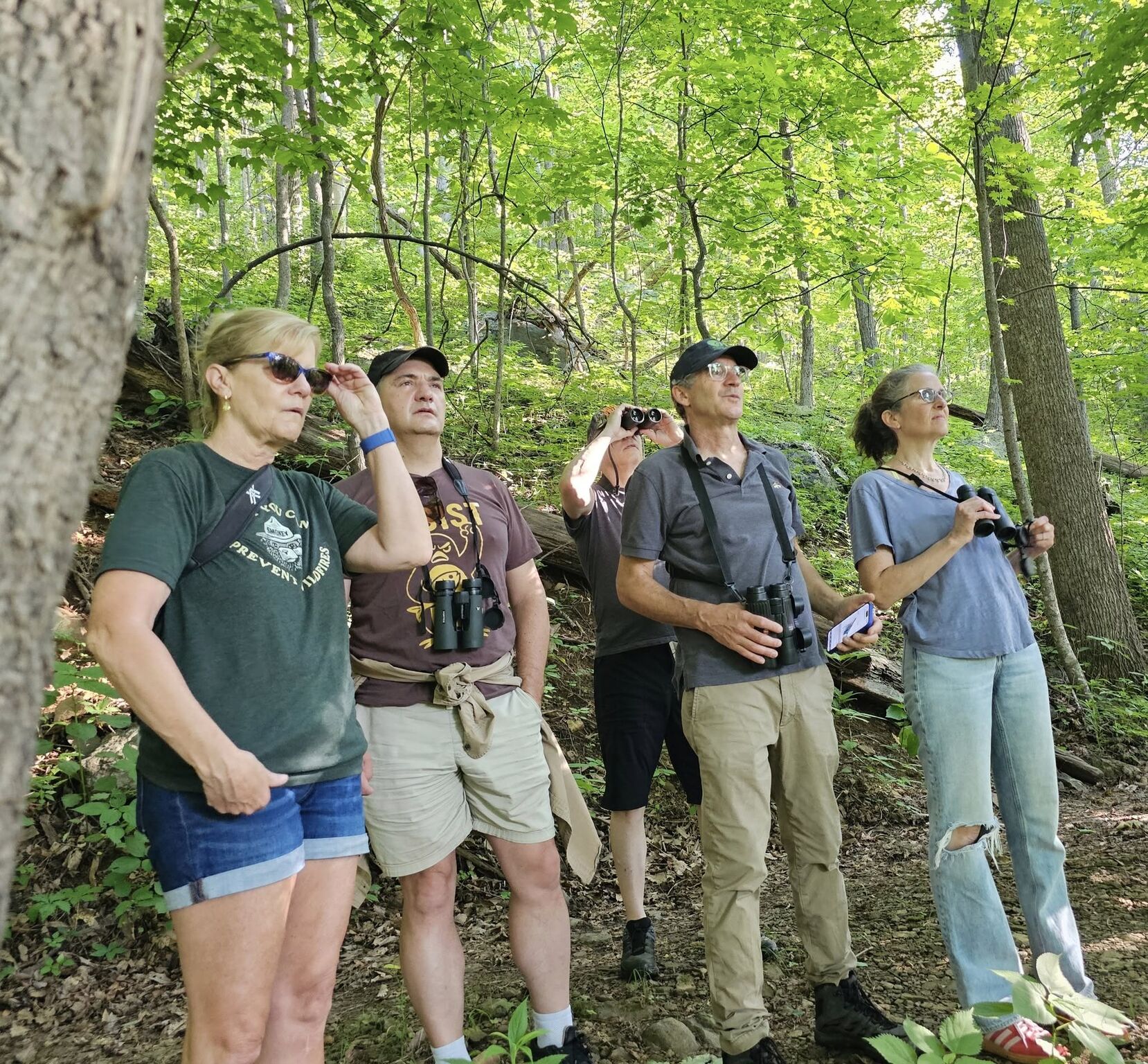 Cristol leads workshoppers for a signature bird walk
