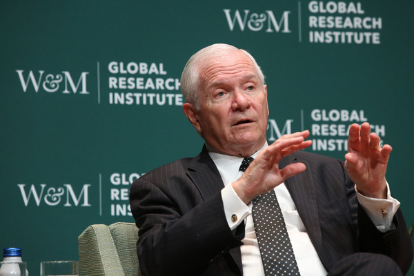 Gates speaks at a Forum keynote.